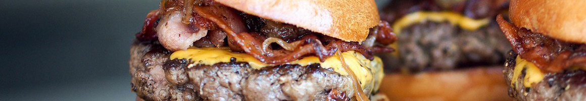 Eating Burger at Flameburger restaurant in St Paul, MN.